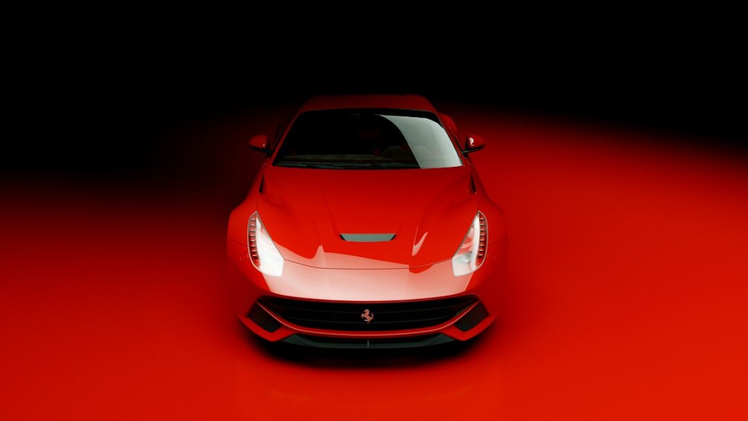 Red supercar photographed in a dark cinematic studio