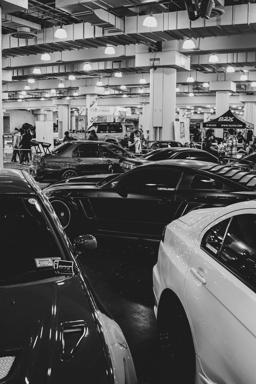 American car dealership lot with rows of vehicles