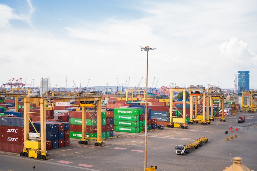 Cars lined up at a shipping port terminal ready for import