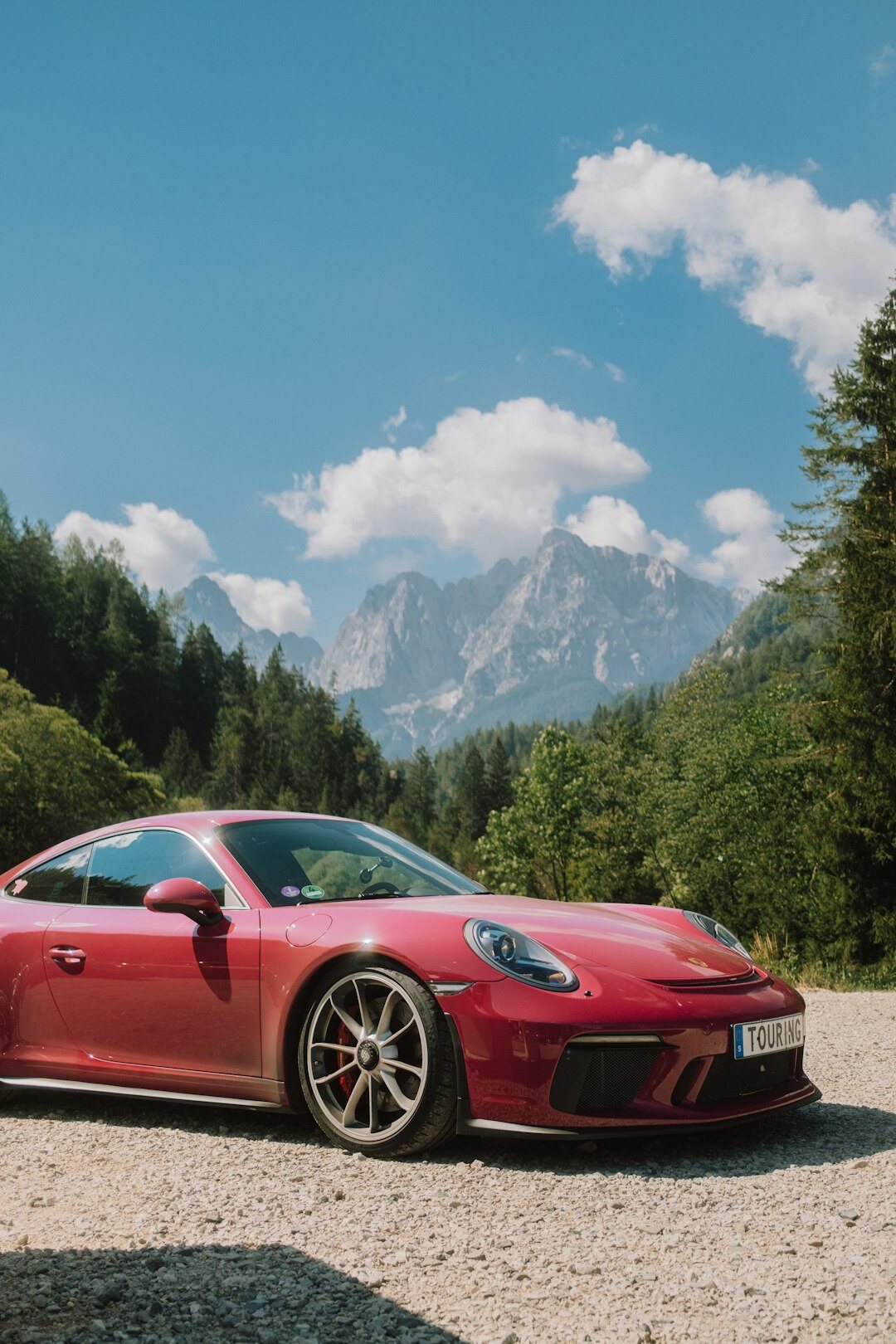 luxury car on mountain road