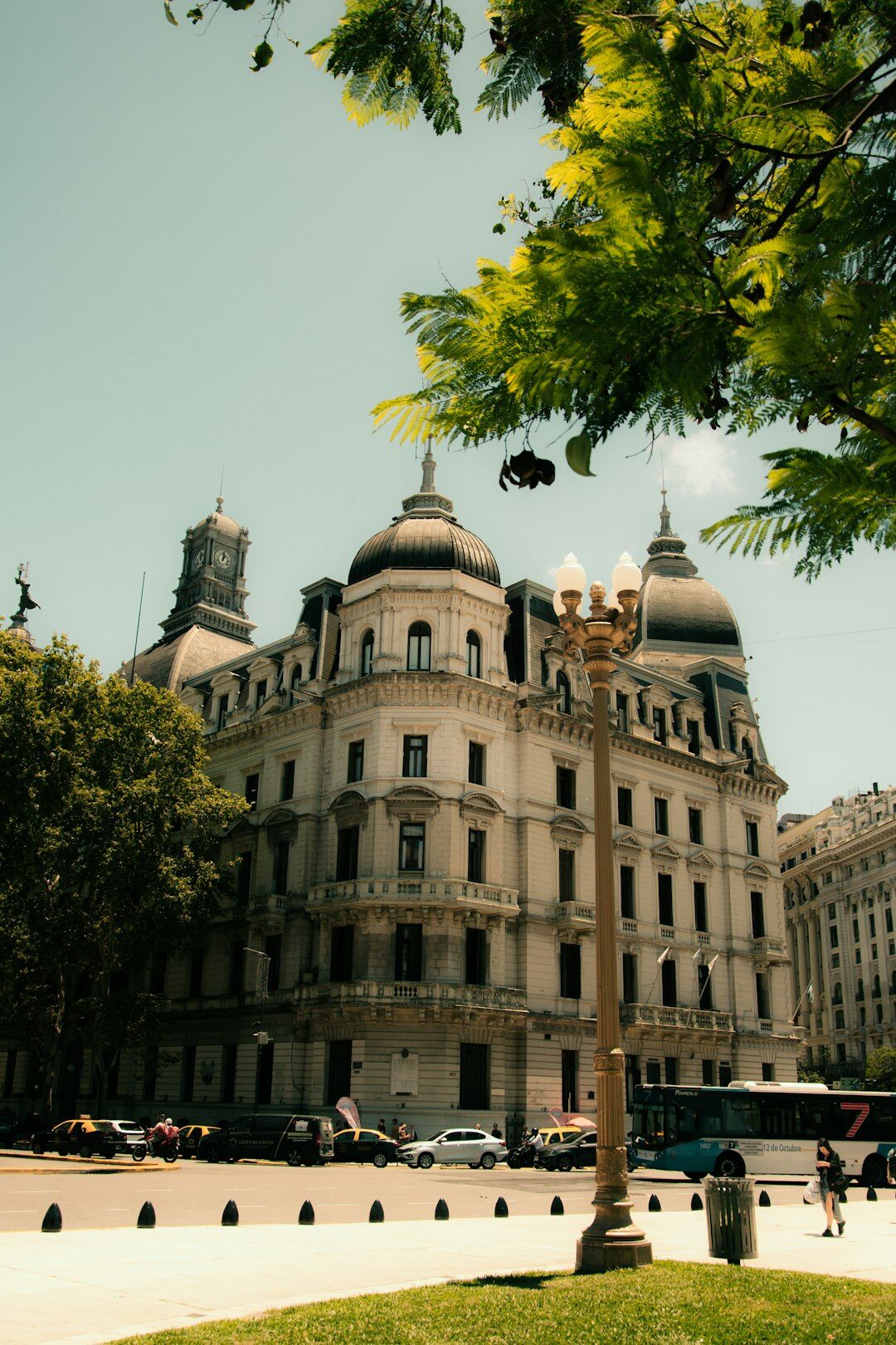 Vehicle parked on a wide avenue in Buenos Aires with classic architecture